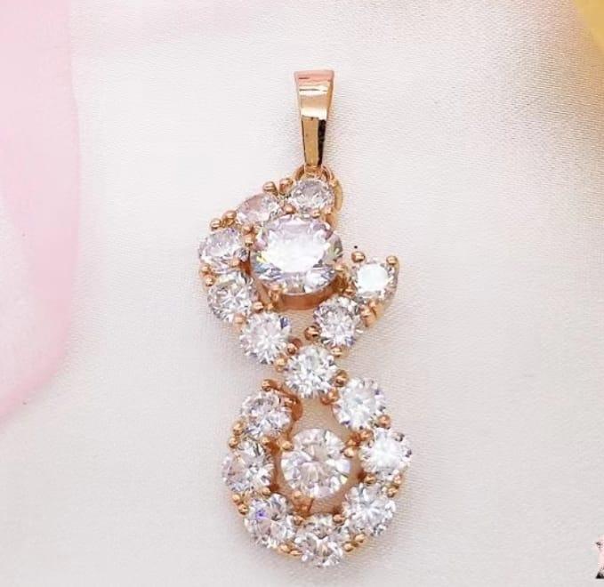 pendentif couleur 18 carats avec pierre.,