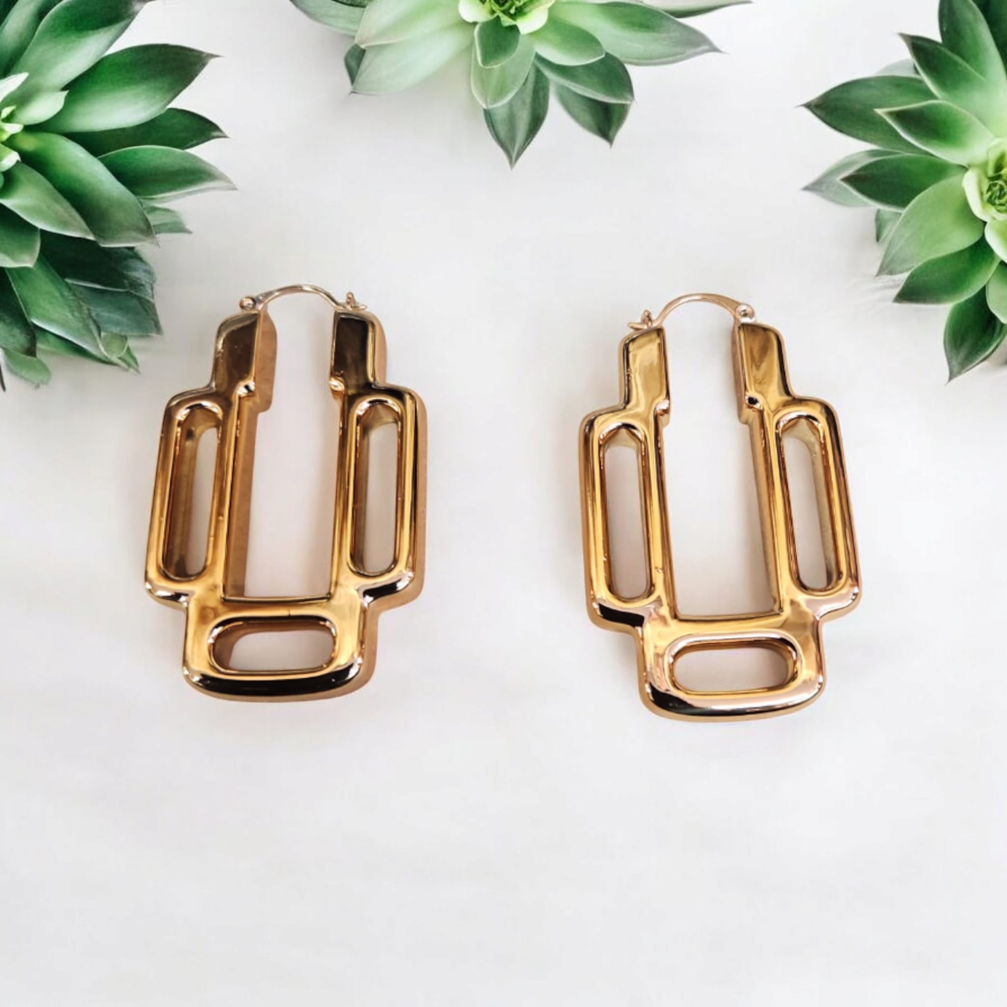 Boucles D'Oreilles haute qualité couleur 18 carats.