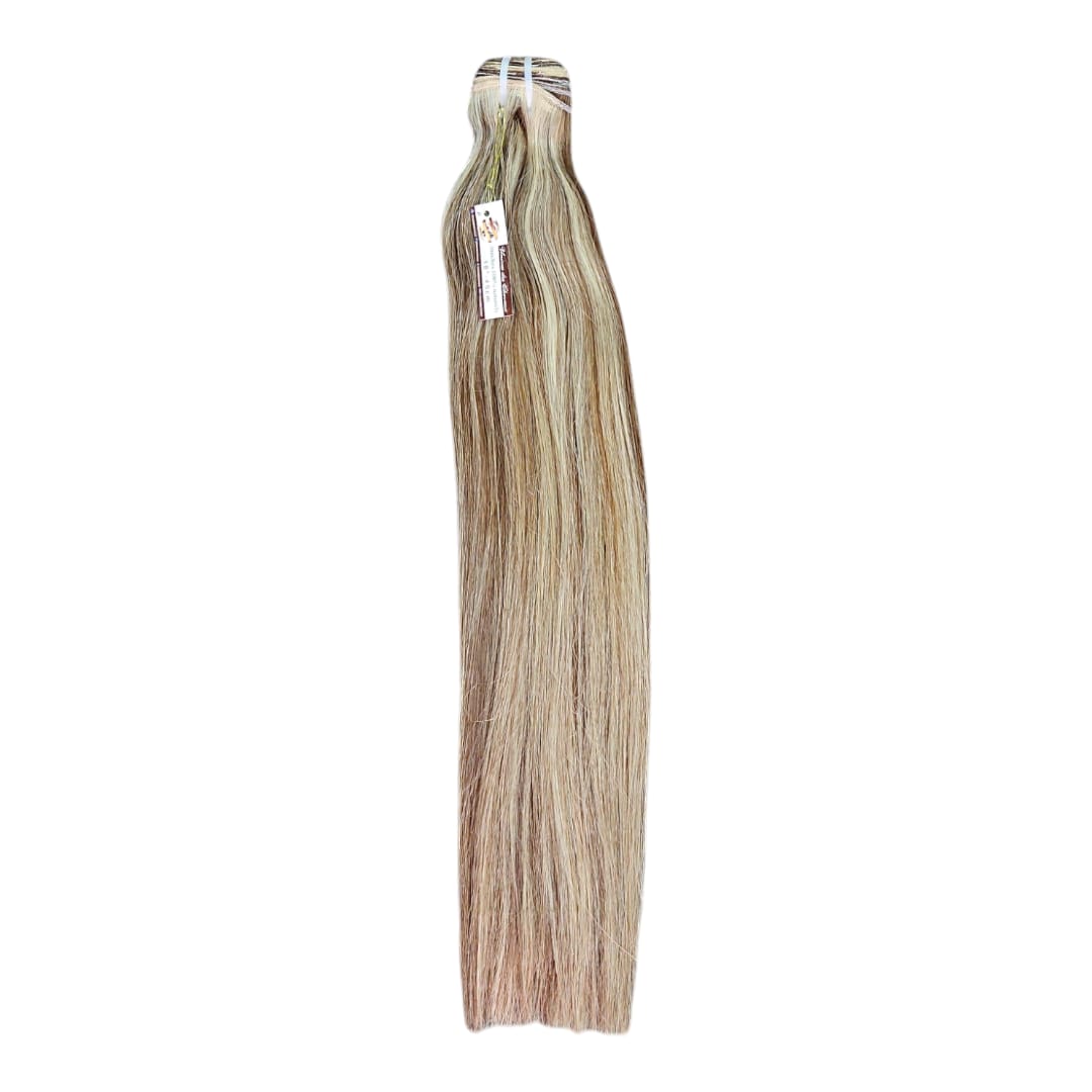 Extention Tissage 100% naturelle.  Cheveux mechés.